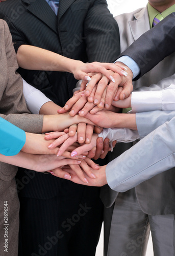 Photo: Hands on top of each other. Symbolic picture. Hands on top of each other. Symbolic picture.