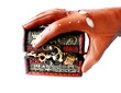 hand in glove holding casket with jewelry