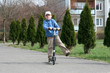Kid and scooter