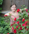 Girl cutting rose