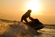 beautiful girl riding her jet skis