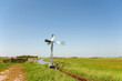 Watermill in vertical Dutch landscape