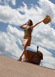 Pretty woman with suitcase and guitar Pretty woman with suitcase and guitar