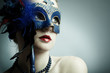 The beautiful young girl in a mysterious mask The beautiful young girl in a mysterious mask