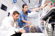 Nurse putting an oxygen mask