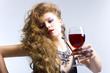 Beautiful woman with glass red wine