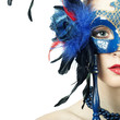 The beautiful young girl in a mysterious mask