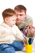Dad drawing with son