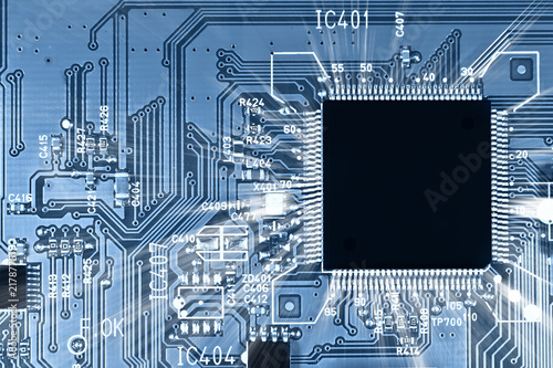 Photo: Microchip circuit with rays Microchip circuit with rays