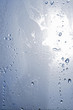 Drops of water on a sheet of glass