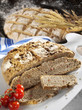 Rustic bacon bread, partly sliced