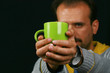 charismatic man drinking tea