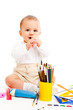Baby boy with pencils