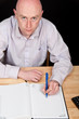 portrait male business man on black backdrop