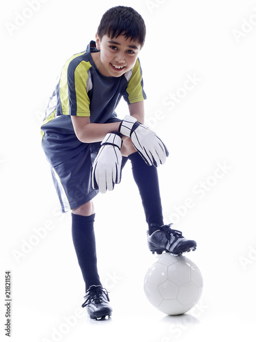 Foto: boy in soccer uniform boy in soccer uniform