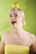 blond with apple on head