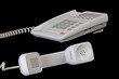 White phone isolated on black
