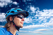 portrait of a young bicyclist in helmet and glasses portrait of a young bicyclist in helmet and glasses