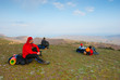 Hikers sit on the slope