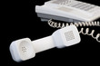 White handset isolated on black