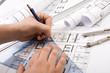 Architectural plans and blueprints in office Architectural plans and blueprints in office