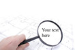 home plans and magnify glass