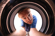 young man in wash machine