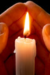 Photo: Candle in hands Candle in hands