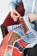 Close-up of woman's hand stitching quilting Close-up of woman's hand stitching quilting