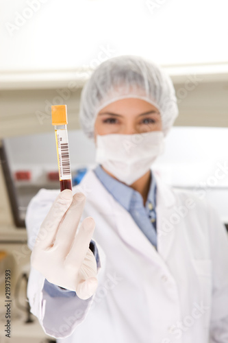 Photo: Holding a tube Holding a tube