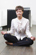 Businesswoman in yoga pose
