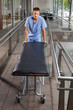 Man pushing a stretcher