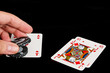 Placing a bet playing cards - Isolated on Black Placing a bet playing cards - Isolated on Black