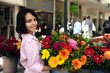 Photo: woman with huge bouquet of flowers outdoors woman with huge bouquet of flowers outdoors