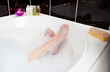 Woman's feet in a bubble bath Woman's feet in a bubble bath