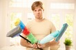 Upset guy with cleaning tools