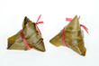 Two Rice Dumplings On White background Two Rice Dumplings On White background