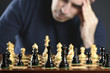 Man at chess board