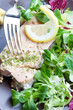 Salmon dish with salad