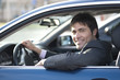 Photo: Smiling businessman driving car Smiling businessman driving car