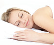 Radiant woman sleeping on her bed Radiant woman sleeping on her bed