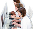 Serious business team working in a call center