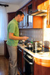 Man in kitchen