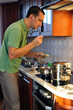 Photo: Man in kitchen Man in kitchen