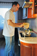 Photo: Man in kitchen Man in kitchen