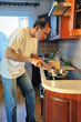 Photo: Man in kitchen Man in kitchen