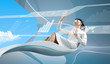 Brunette oparating interface in bio armchair