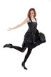 Smilling girl dancing on white background