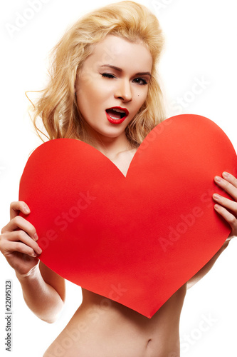 Photo: Beautiful woman with big red heart Beautiful woman with big red heart