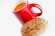 Cup of Tomato Soup with Brown Roll